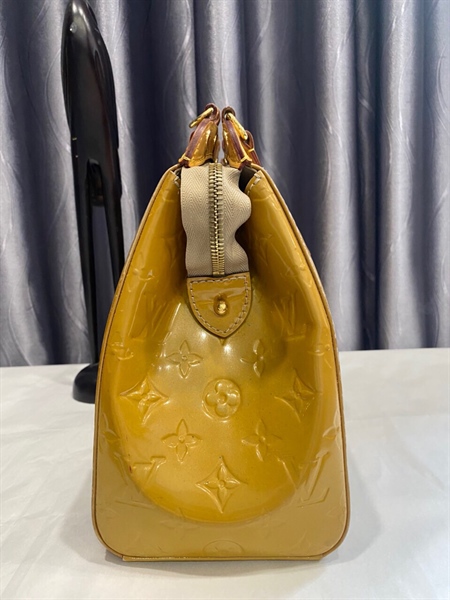 Túi LV vàng nghệ KG+