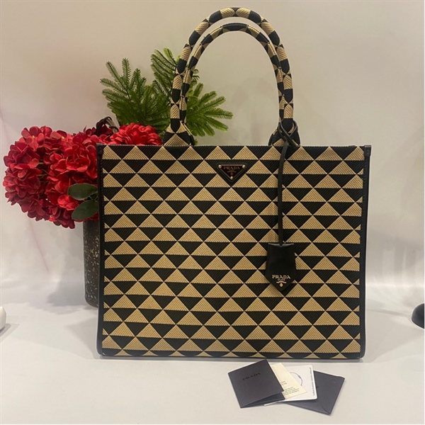 Túi Prada đen vàng KG+