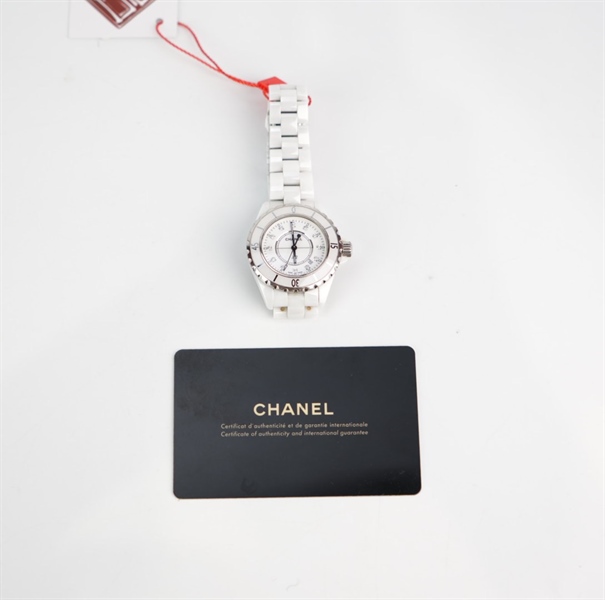 Đồng hồ Chanel dây trắng mặt tròn KG+