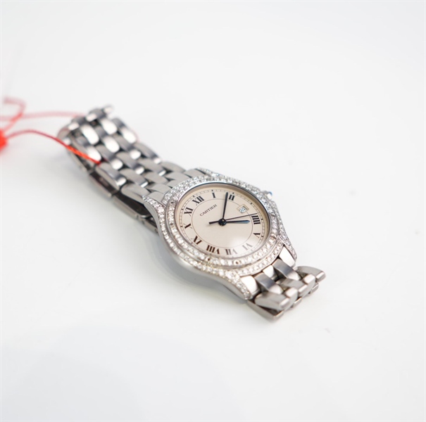 Đồng hồ Cartier bạc mặt tròn viền kim KG+