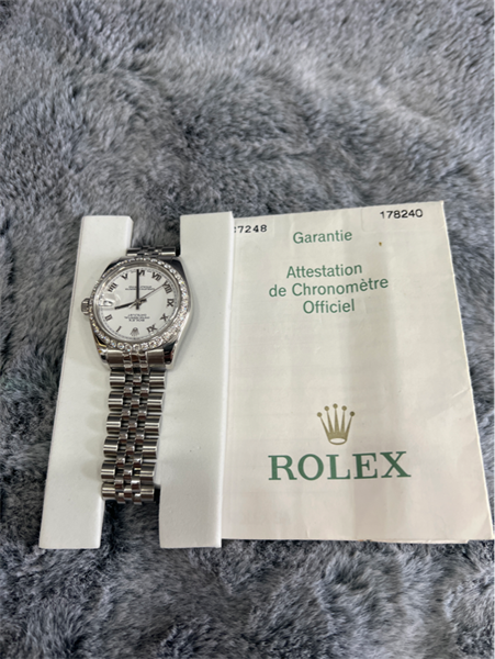 Đồng hồ Rolex bạc mặt viền kim+