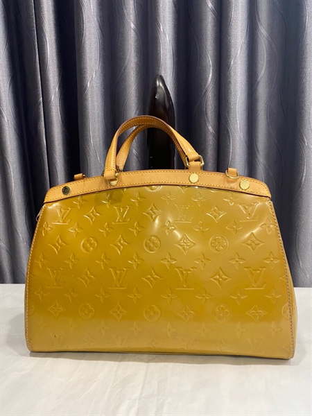 Túi LV vàng nghệ KG+