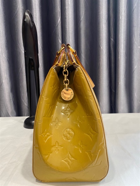 Túi LV vàng nghệ KG+