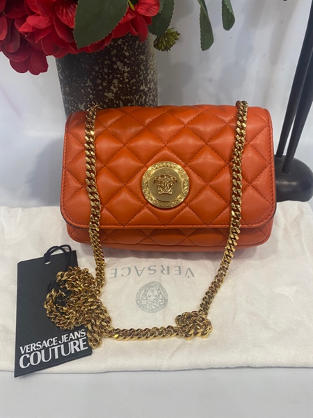 Túi Versace cam KG+