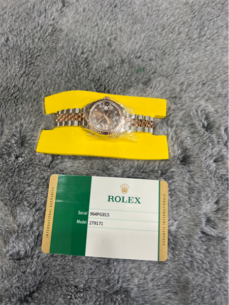 Đồng hồ Rolex vàng đồng nhỏ +
