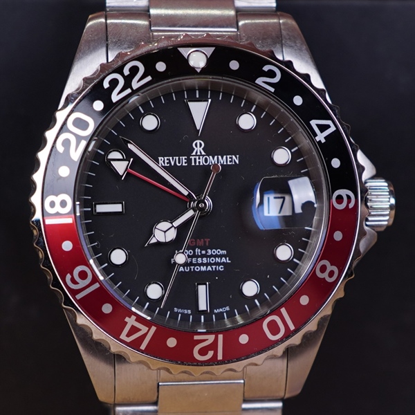 Đồng hồ nam revue Thommen mặt tròn viền đen đỏ KG+