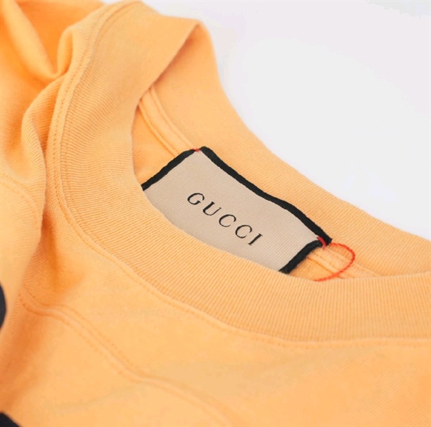 Áo GG màu vàng in 25 KG+