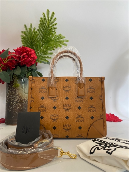 Túi xách MCM vàng KG+