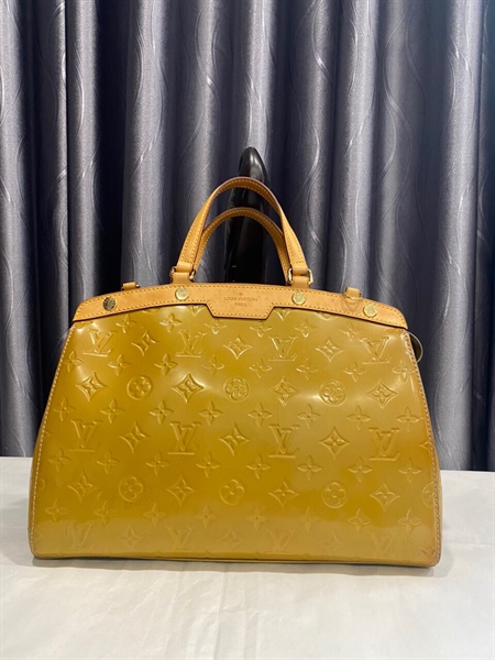 Túi LV vàng nghệ KG+