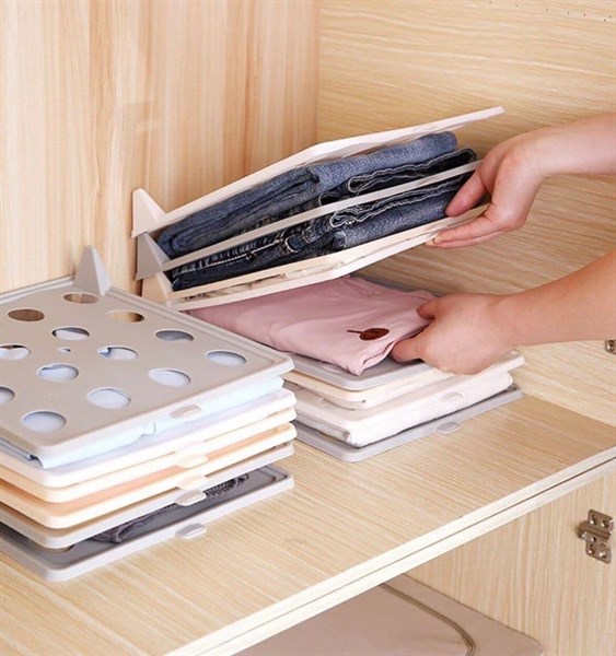 Dụng cụ gấp gọn quần áo