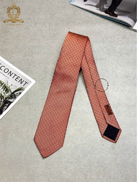 Cravate Hermes cam hoạ tiết